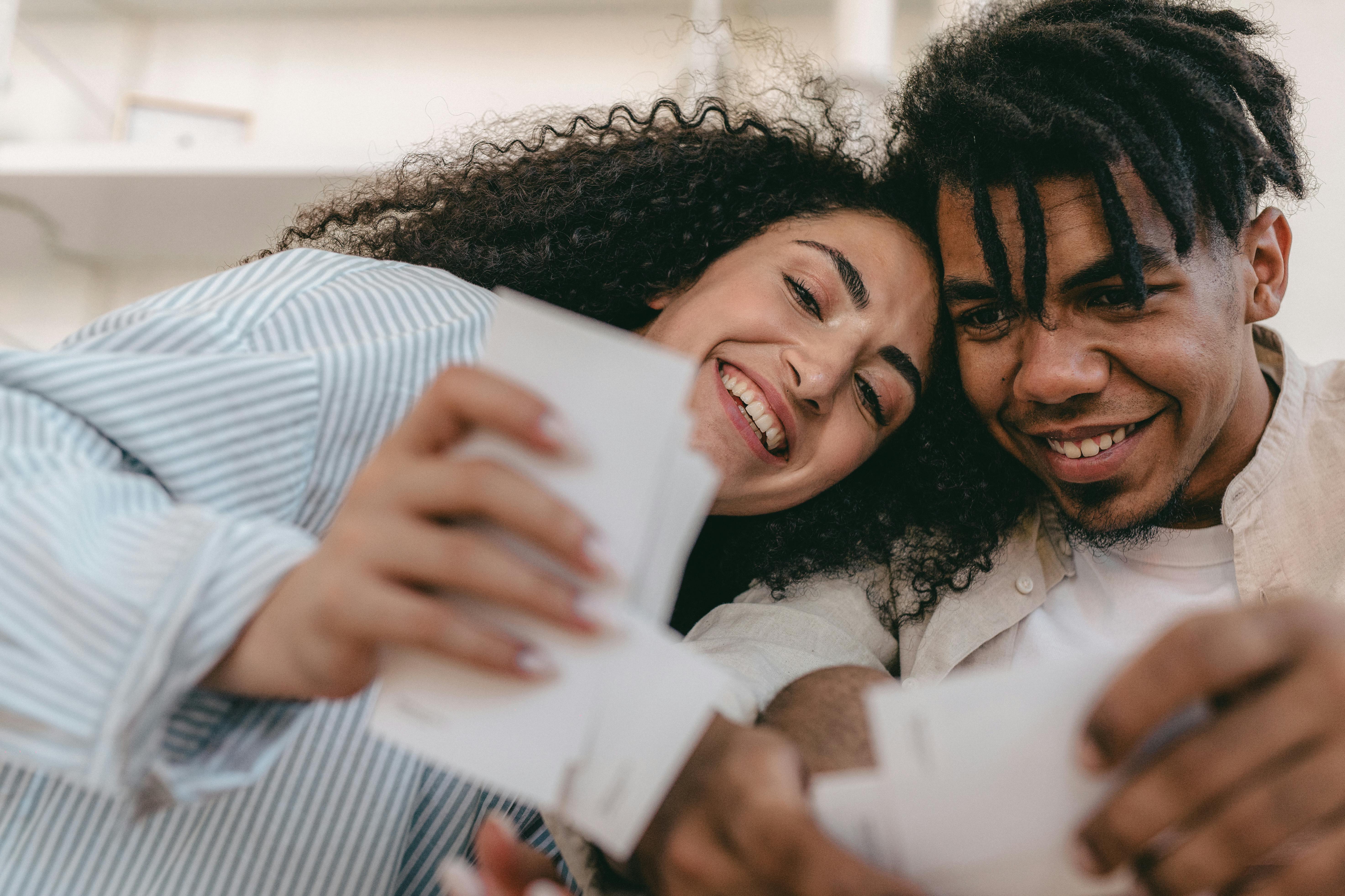 a couple looking at photos
