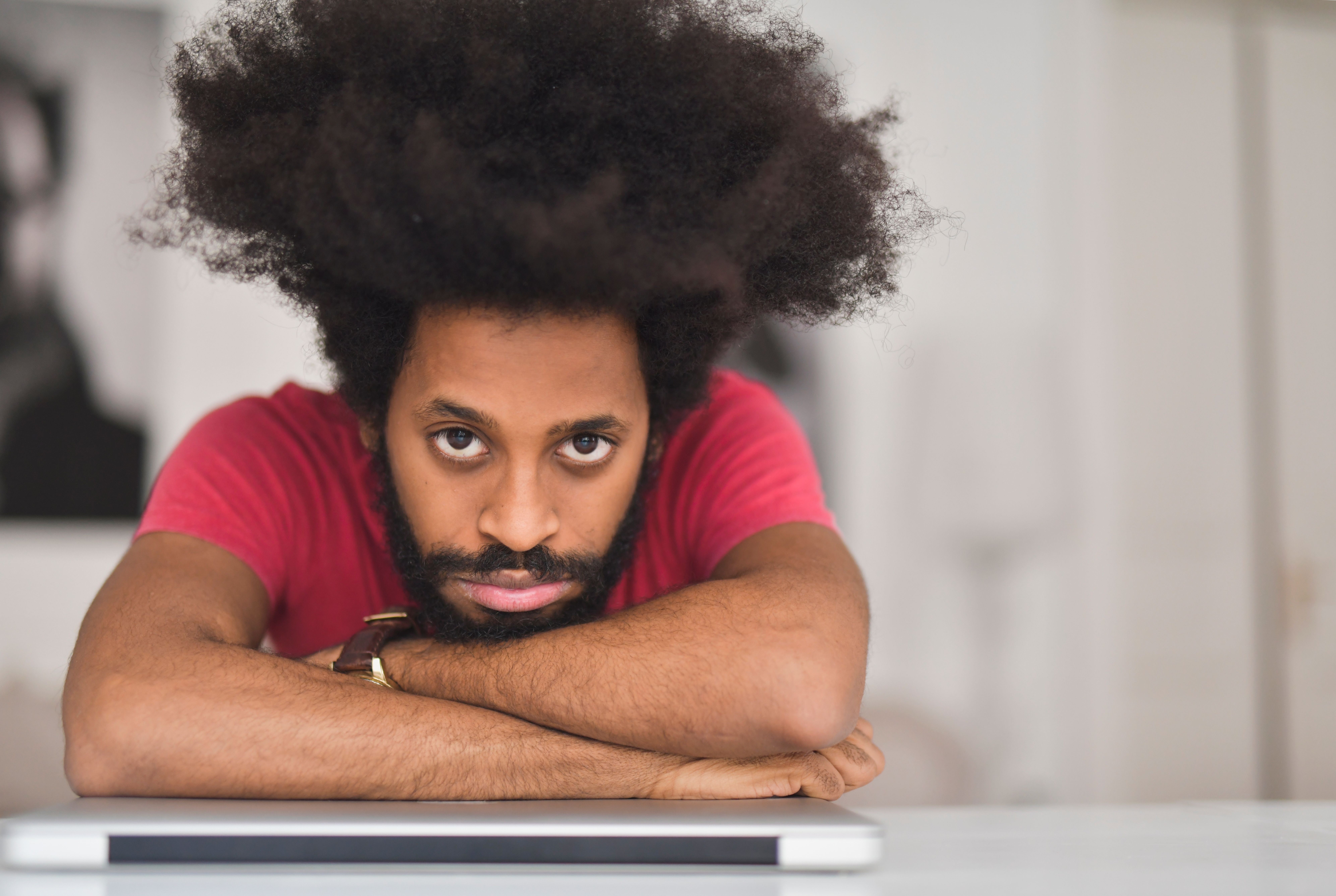 A man feeling tired of overthinking