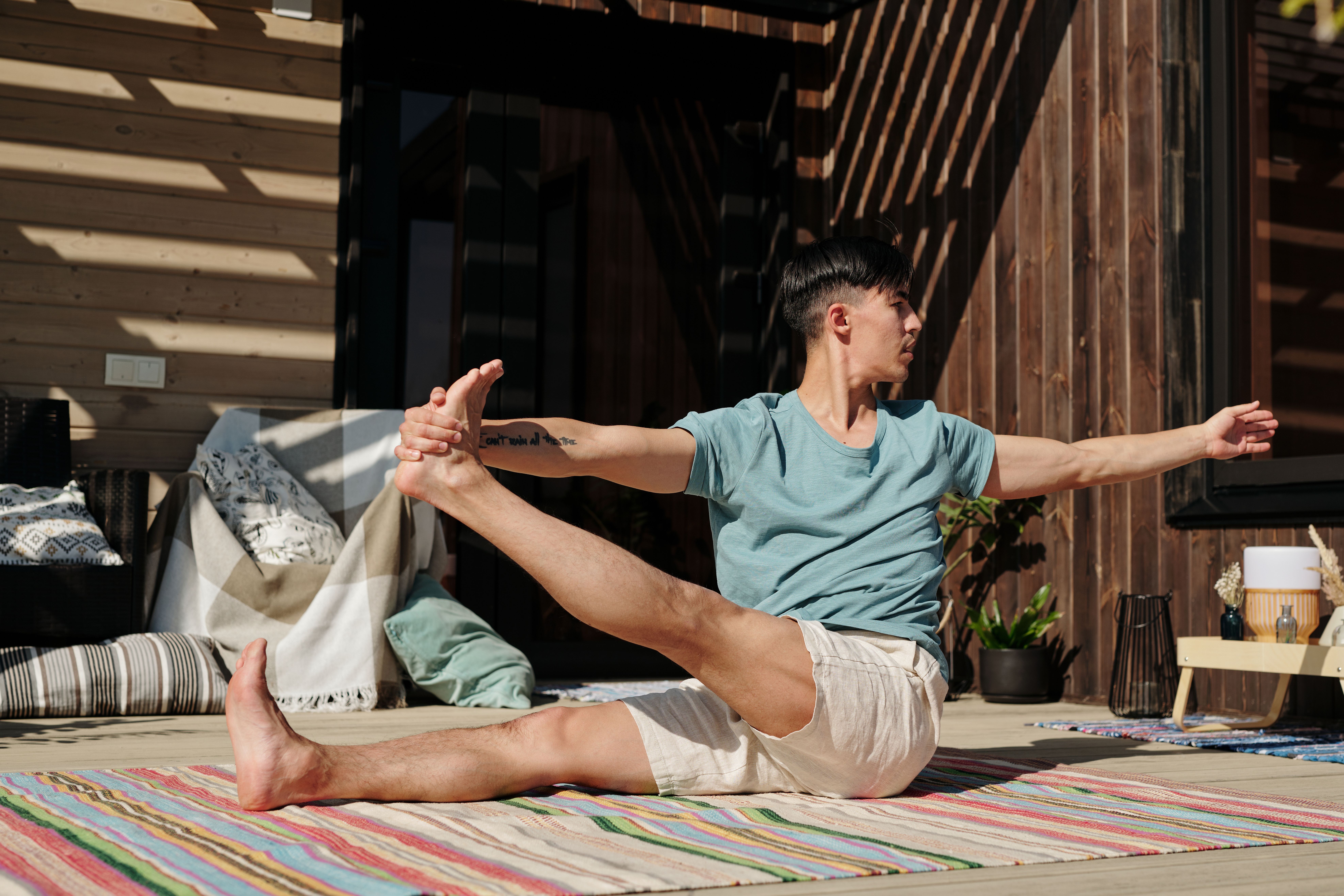 A man stretching in the balcony